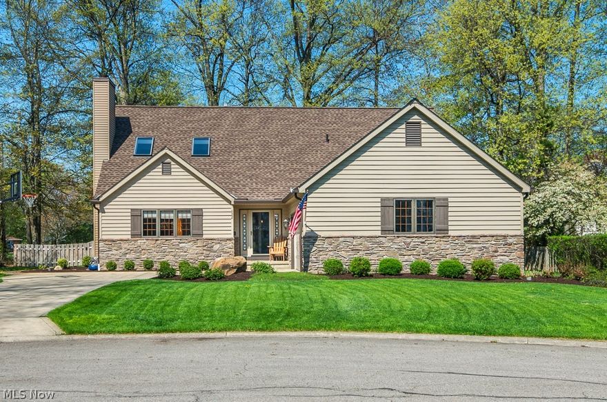 This is the one you've be waiting to hit the market! Pristine 4BR completely and tastefully remodeled with todays modern finishes. Giant eat-in Chef's kitchen with stainless steel appl, granite, breakfast bar and 2 pantries. Master suite with Stunning private bath w/ title shower, double shower heads and double sinks! Brazilian hardwood flooring and new carpet throughout! Huge loft family/billiard rm w/wet bar! Finished basement! Private cul-de-sac lot. Backyard is outstanding, complete with paver patio, Amish built shed & fence! Wired inside and out for sound. Updated roof, furnace, AC, light fixtures carpet, paint, stoned fireplace, too much to list here! Walk to the lake and enjoy beautiful Bay!