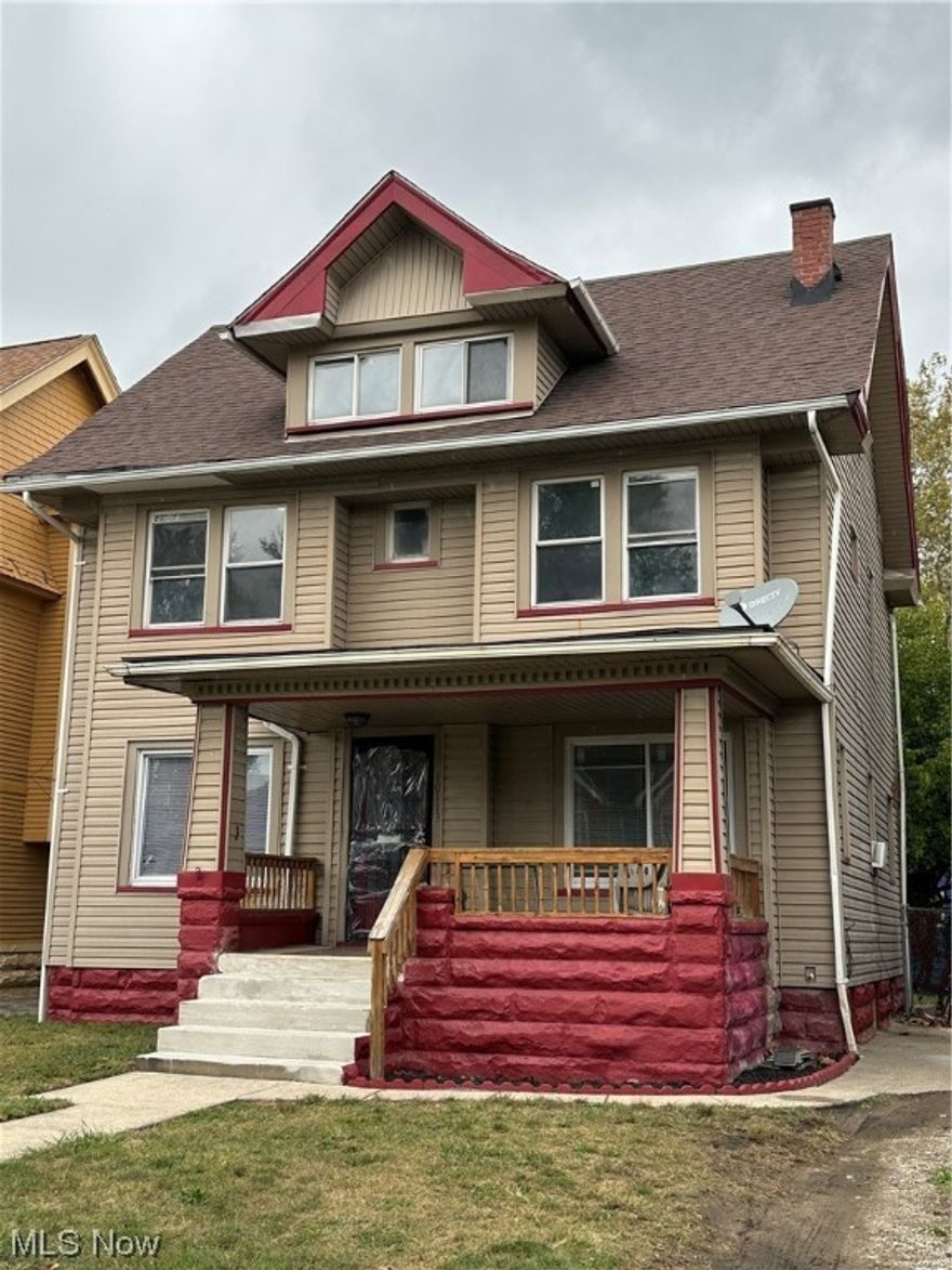 Nicely updated large 5 bedroom house with fresh paint, new carpet and move in ready!  This could be a great investment property or home for a new buyer.  Great space with large rooms.  Enjoy the front porch and large back yard.  Attic is finished for additional sq footage with 2 bedrooms.