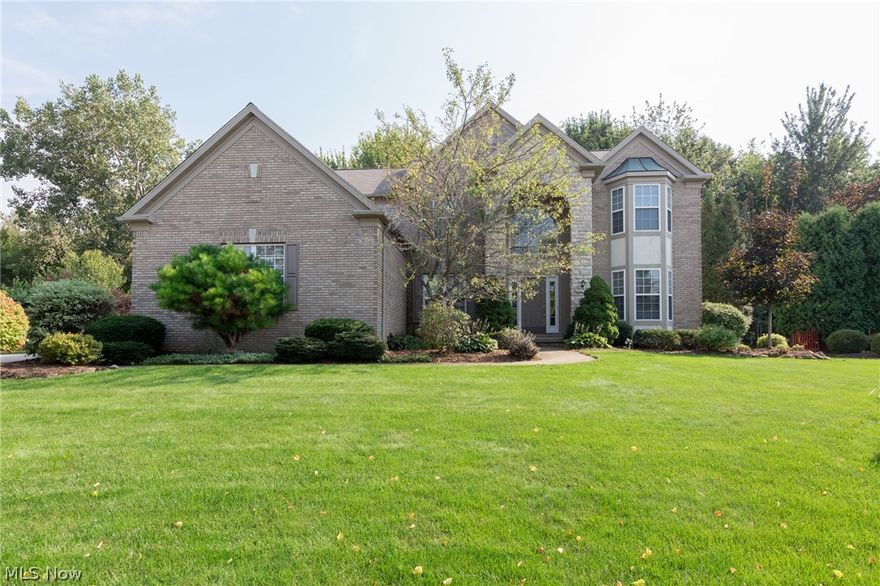 Great Location on Low Traffic Cul-de-Sac Backing to Private Wooded Area! Brick/Stone Front and Vinyl Two Story Over 2900 Square Feet! Open Two Story Ceramic Tile Foyer Entrance with Double Staircase, Living Room and Formal Dining Room, Nine Feet Ceilings First Floor! First Floor Den/Fifth Bedroom (In-law Suite) with Closet and Full Bath! Spacious TWO STORY Family Room with Palladium Windows and Fireplace! Huge Eat-In Ceramic Tile Kitchen with Center Island and Breakfast Nook! All Appliances Stay Stainless Steel Including Double Oven Stove, Fridge, Microwave, Dishwasher Including One Year Warranty! Four/Five Bedrooms Possible with Three Full Bathrooms, Full Partially Finished Basement with Several Finished Rooms Including a Second  Laundry Room with the Second Washer and Dryer that could be Included! Two Hot Water Tanks! The Master Bedroom Suite has a Second Gas Fireplace, Vaulted Ceiling and Spacious Vaulted Bath with Double Vanity Tub and Shower! The Master Closet has Separate His and