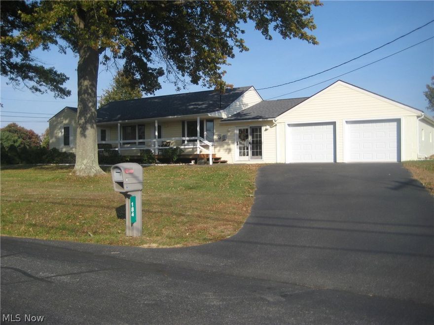 Exceptionally well maintained, newer windows, roof, and furnace, lovely HW, back deck, covered front porch, double fenced lot, oversized 2 car garage- room for workshop or extra storage, road maintenance fee $100 pd for 2017.