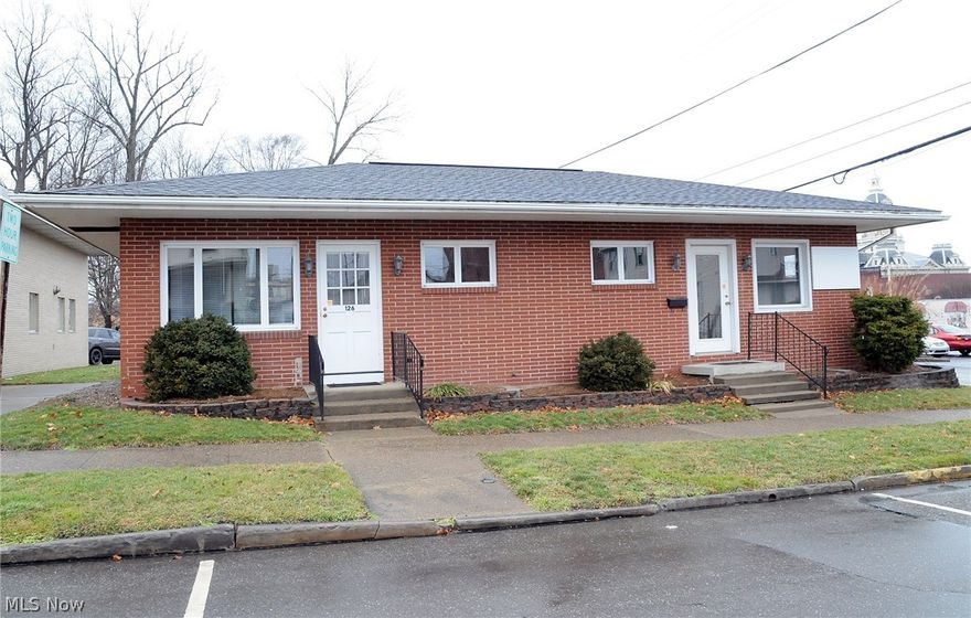 Brick office building that would be great for Retail or any type of Doctor or Dentist offices. Building has a FULL basement that is very clean and could make additional office space .