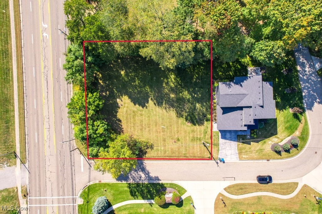 Rare building lot within Green Local Schools WITH DEEDED BOAT DOCK on Portage Lakes - bring any builder and get moving to the lake! **Public water & public sewer available** - Included in Heron's Watch subdivision - $250/mo HOA fee covers dock and common area maintenance, snow removal including shoveled/blown driveway. Architectural requirements by the HOA are available upon request to the list agent.