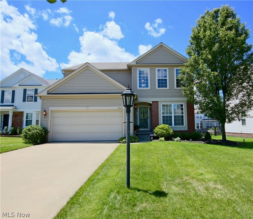 If you’re tired of today’s market of a million shades of grey homes, you're in luck! Fabulous contemporary earth-tone 3 bedroom, 2 1/2 bath home in the sought after New Hampton’s beautifully manicured community is now available. Natural light drenches the soaring 2 story foyer with chandelier and the front flex room can be used as a formal dining room, sitting room, office or den! Private powder room is off the great room with cathedral ceiling and corner focal point gas fireplace. Spacious open great room flows into the eat-in kitchen with center island, new gorgeous backsplash, under cabinet lighting, stainless steel appliance suite, beautiful carved details into the many cabinets and glass sliders lead to the beautiful yard with custom patio and jungle gym! The convenient 1st floor laundry room leads out to oversized attached 2 car garage completing the first floor! Lofted 2nd floor has 3 bedrooms and 2 full baths. Huge owner's suite enhanced with vaulted ceiling also has private en