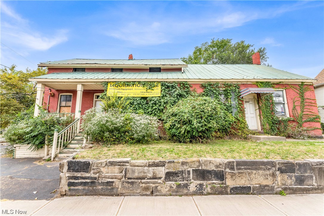 So much opportunity!! This multi home has 2 apartment units that have private enterances. The first floor unit has 1 bedroom & 1 bath. The upstairs unit has 1 bedroom & 1 bath. Another unit with a separate enterance & parking features a space that was used as a barber shop with a bathroom. The other space was used as Carmen's Key Service for over 40+ years. Attached garage. Drive way space on the side of what was Carmen's key Service. Furnace & central air new only a few years old. Minutes from downtown, very close to Ohio City, & Metro Hospital. The buidling has a very interesting historical history if interested please see attachments. Must See!!