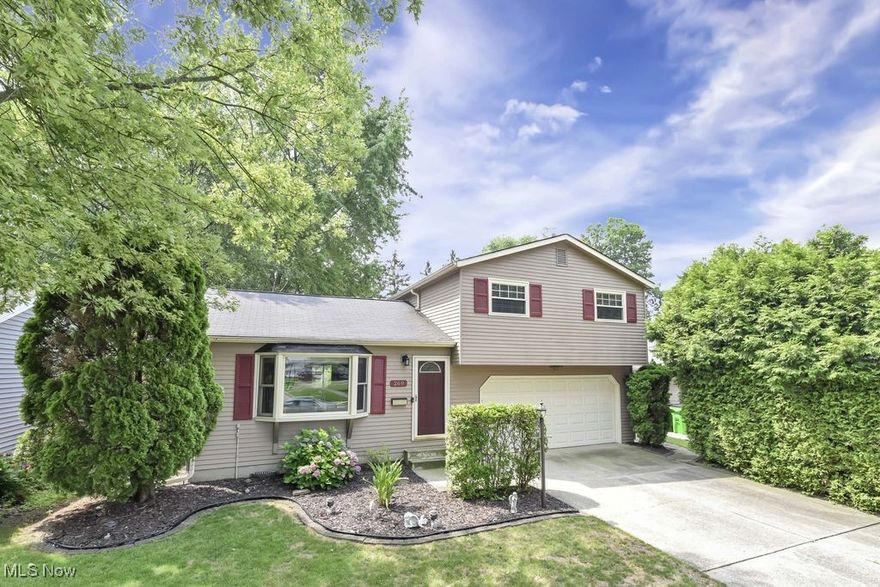 Nestled in the picturesque community of Berea, Ohio, this charming three-bedroom, one-full-bath split-level home is situated on a tranquil, tree-lined street, offering a peaceful retreat. The property features a **backyard** complete with a **walkout deck** that overlooks a fully fenced-in area, perfect for outdoor gatherings or enjoying quiet moments in nature. Step inside to discover an **inviting living room** that is flooded with **natural light**, creating a warm and welcoming atmosphere. The space flows seamlessly into the **modern kitchen**, which boasts **luxury vinyl flooring**, newly painted cabinets, and **stainless steel appliances**, making it a delightful space for cooking and entertaining. An impressive addition features **vaulted ceilings** and abundant natural light, providing an ideal setting for relaxation or hosting friends and family. On the second level, you will find three **spacious bedrooms** adorned with newer flooring, ensuring comfort and style. A **gorgeously updated full bath** completes this level, offering modern amenities and finishes. Newer washer, Dryer, refrigerator, hot water tank, and more! Move right in and seize the opportunity to make this beautiful home your own. Don’t miss out on this gem in Berea!