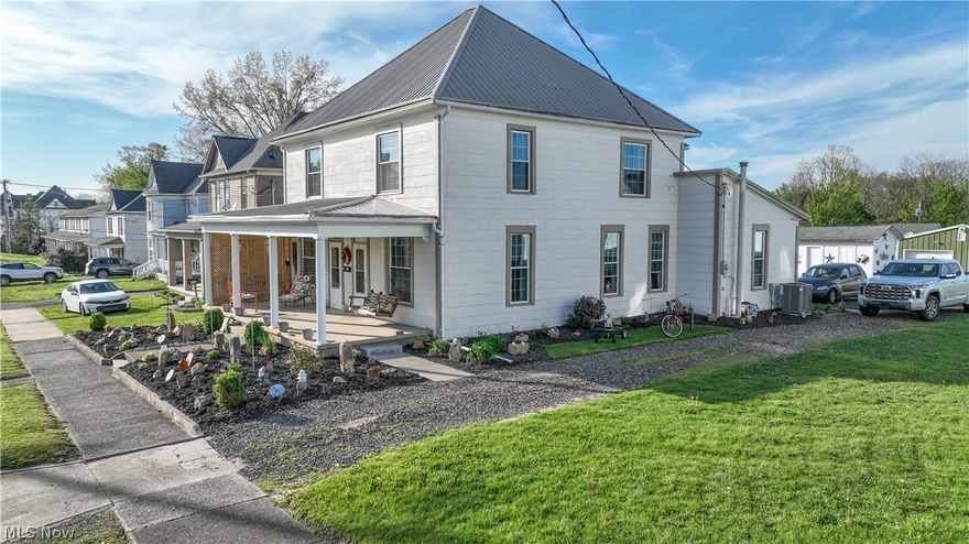 This versatile and well maintained property offers a unique opportunity for homeowners and investors alike. Currently configured as a spacious single family residence, the home can be easily converted back into a duplex with the simple addition of one wall, while retaining fully separate utilities for each side. Each living space boasts over 1,200 square feet, providing generous room to live comfortably. Both sides feature inviting main floors with a bright living area, formal dining room, functional kitchen, and a convenient main floor bedroom. The left unit also includes a half bath on the main level for added convenience. Upstairs, each side offers a large bedroom, a full bathroom, and a versatile bonus room, perfect for use as a captured bedroom, home office, playroom, or cozy reading nook. The property has seen numerous important updates, including two new furnaces, two new central air conditioning units, updated electrical panels, and a brand new Generac generator servicing the left unit. The rear sunroom has been completely rebuilt and includes dedicated laundry hookups for each side, enhancing both functionality and comfort.
Outside, the home offers ample parking with a private driveway, alley access, and additional off street parking behind the home. A storage shed is also included, providing extra space for tools and equipment. Whether you are seeking a spacious home for a large or multigenerational family, an income producing duplex, or the flexibility to live in one unit while renting the other, this property presents endless possibilities.