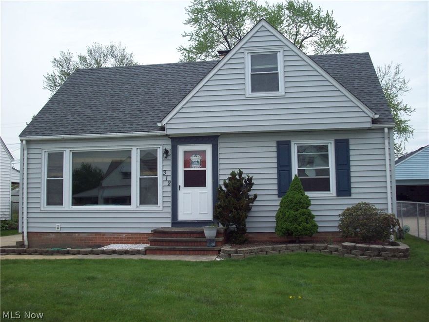 Beautifully updated 3 bedroom, 1.5 bath Bungalow. Spacious, light filled living room with refinished hardwood floors. The kitchen with ceramic floors, breakfast bar w/storage drawers leads to the dining room through french doors making entertaining a breeze.. Dining room could be used as a family room. Two generous bedrooms and a full bath on the first floor and a  master on the 2nd floor with an abundance of storage. Recently remodeled lower level with large rec room, 2 additional room that could be used as a home office, craft room or storage plus a large utility room. Updates include roof and siding in 2010, Bath Fitters one piece tub in 2015, furnace and A/C in 2001, new carpet in basement, new vanity in half bath. HOME WARRANTY THRU AMERICA'S PREFERRED