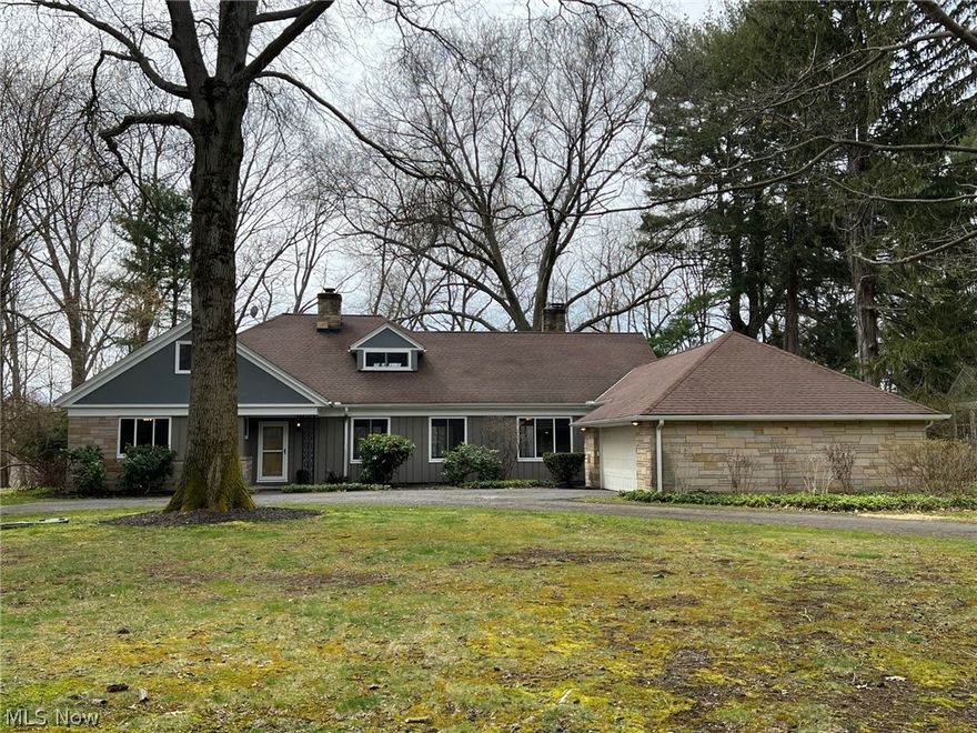 Beautifully Renovated inside & out and top to bottom! This Incredible Cape Cod home is set on nearly 1 park-like acre and boasts over 3600 sqft of living space, 4 Bedrooms, 3.5 Baths, all new flooring, trim, interior doors, lighting & plumbing fixtures and freshly painted w/neutral decor throughout! Vaulted Foyer entrance welcomes you into the bright & light Living Room w/wall of windows, stone wood burning fireplace & gorgeous engineered wood floors. Spacious Dining Room w/built-in hutch/china cabinet & access to the 3-Season Sunroom & deck. Gourmet Eat-in Kitchen includes custom cabinets, granite counters, center island breakfast bar, mosaic tile backsplash, wood floors, recessed lighting & under cabinet lighting. All Baths have been remodeled from floor to ceiling w/granite vanities, all new fixtures, lighting & ceramic tile flooring. 1st flr Master Bedroom w/dressing area and Stunning Glamour Bath w/double sink granite vanity, free-standing soaking tub & wheelchair accessible curbl