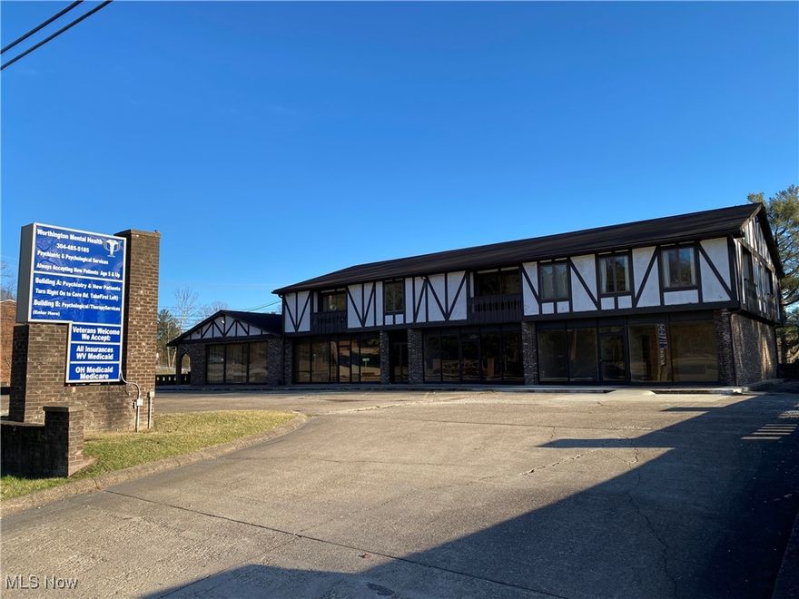 Located at the corner of Core Road and Old St Marys Pike/ Convenient to Rt 2N and I-77, right side of the building was being renovated- 2 new baths, office spaces & reception area. Great office space for numerous kinds of businesses, paved parking, Tudor style exterior. Outside has had recent painting, new wall installed.