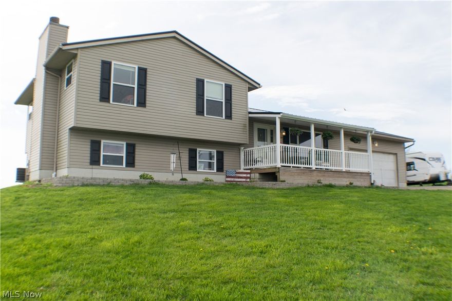 Enjoy your own piece of the country with this 3 bedroom 2 full bath quad-level home. It features 8.29 acres m/l only a few minutes from State Rt. 16, an easy commute to Zanesville, Newark and Coshocton! This family home features a nice size first floor living room, and another large family room on the lower level with a beautiful white washed wood burning fireplace. A large front yard and back yard for lots of personal enjoyment. The nice size kitchen comes with beautiful back views of the property. Updates include flooring throughout, newer stainless kitchen appliances, a brand new metal roof/gutters, garage door & updated master bath! Privacy and a country setting await!

Additional note: A possible third bath has already been rough plumbed to make your own! 

Seller reserving garage cabinets and peonies (side of garage)