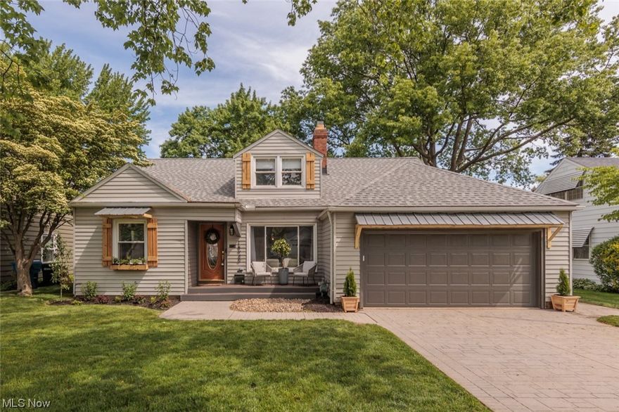 Prepare to be dazzled by this gorgeous cape cod residence! Newly transformed with a fabulous makeover, this home seamlessly blends modernity with classic charm. Boasting 3 bedrooms and 2.5 bath, the modern updates and personal design finishes add a sparkle to every room. 
Stunning curb appeal with all new landscaping, a brand-new porch addition, custom wood shutters and metal canopy, new exterior lights, and more.
Step into the welcoming living room where a beautiful fireplace and custom grid wall sets the stage. The adjacent dining room’s beautifully added Crawford ceiling above custom cabinets and floating shelves transitions to a spacious enclosed sunroom with a newly added fireplace. The brand-new kitchen is equipped with all new cabinetry, stainless steel appliances, Calcutta quartz counter tops, and a stunning Cedar planked ceiling.
Discover two bedrooms and an updated full bath tucked away in a hallway off the living room on the first floor. The spacious primary bedroom offer