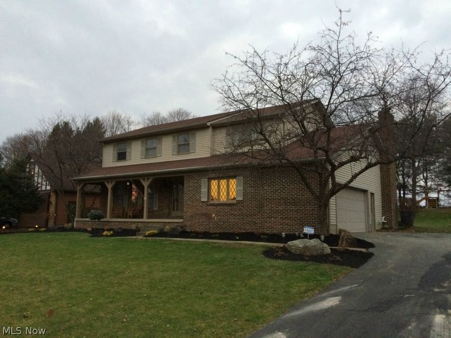 Spacious colonial, large welcoming, freshly painted rooms with new lighting and ceiling fans, newer carpet, updated baths.  Kitchen with new stainless appliances and pantry and dinette.   LR, DR, Family Room with fireplace and wet bar, 4 large bedrooms, Master includes Master bath and walk in closet.  Abundant storage, 2 1/2 oversized garage.  All new landscaping in 2014 (approx. $3,000).    Brand new, huge vinyl shed ($6,000)

*Window treatments, washer, dryer and Upright freezer do not stay