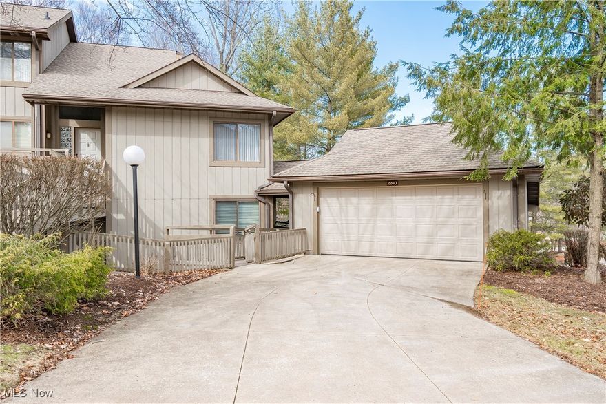 Welcome to this spacious and beautifully updated 3-bedroom, 2-full bathroom condo in the heart of Cuyahoga Falls! Nestled in a serene wooded setting, this home offers both privacy and convenience, with stunning views of nature from the eat-in kitchen and back deck. Step inside to discover a thoughtfully designed floor plan with luxury plank flooring throughout the kitchen, which comes fully equipped with sleek stainless steel appliances. Enjoy meals in both a formal dining room and a cozy dining area off the kitchen, which overlooks the tranquil, tree-filled backyard and provides direct access to the private deck-perfect for outdoor relaxation or entertaining. The large living room features a welcoming fireplace, creating a cozy atmosphere for gathering with family or friends. The oversized owner's suite is a true retreat, offering a spacious walk-in closet and a private bathroom with a double-sink vanity, a beautiful shower, and an expansive linen closet for added storage. Two additional generously-sized bedrooms provide plenty of space for family, guests, or an office, with one offering direct access to the second full bathroom. Recent updates include new windows and treatments (2024), fresh paint throughout, and new flooring in the living room, entryway, office, and dining room (2025). This condo offers a blend of comfort, style, and nature, making it the perfect place to call home. Don't miss out-schedule your private tour today!