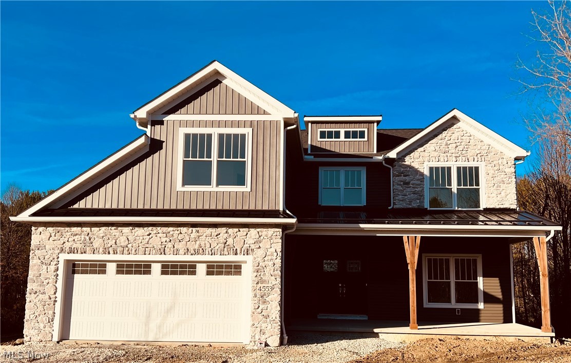FREE NATURAL GAS & NO City taxes! Striking modern colonial custom built by Nell Homes with energy plus smart home features that offer quintessential Ohio indoor/outdoor living. Sitting on nearly 3 partially wooded acres, this newly completed home has 3,025 finished square footage, with 5 bedrooms, 2.5 baths offering adaptable rooms, high ceilings, and rich natural light. Upon entrance, you are warmly greeted with luxury vinyl floors, neutral paint colors, and a bright & open floor plan seamlessly connecting the kitchen to the living room, and leading to the inviting, maintenance free back deck. Meticulous attention to detail is presented in the kitchen with granite countertops, customized backsplash, solid wood cabinets, and new professional-grade Bespoke appliances. The kitchen also boasts a magnificent center island, and a large walk-in pantry with solid wood adjustable shelving. Adjacent to the living room, there’s a large bedroom/office close to the half bath. 8' basement ready to be finished. Upstairs you will find a loft area, 4 additional bedrooms, each with walk-in closets. Premium stainproof carpet is like walking on a cloud. Convenient upstairs laundry, tiled showers, all granite countertops & premium features throughout! Right size, right price new construction is hard to come by in Medina, so schedule a showing today before it’s too late!