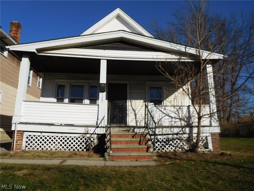 Sold as is.  Covered front porch. Security doors. Living room with decorative fire place. Dining area. 2 full baths. 3 bedrooms. kitchen. unfinished basement.