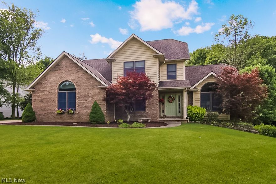 THE BEST OF BOTH WORLDS***ENJOY THE BEAUTY OF THE COUNTRY IN THE CITY STYLE COMFORT OF THIS CUSTOM BUILT COLONIAL***IT’S CRADLED IN ONE OF THE MOST SPECTACULAR SETTINGS WITH CUYAHOGA  VALLEY NATIONAL PARK IN YOUR OWN BACK YARD***THIS PREMIUM LOT OFFERS TWO DECKS AND A PATIO TO ENJOY THE QUIET AND/OR SOUNDS OF THE MANY  WILDLIFE  THAT CALL THIS HOME**** TRULY A TURN KEY *** KITCHEN FEATURES GRANITE COUNTERTOPS, NEWER STAINLESS STEEL APPLIANCES, DINETTE WITH SLIDER TO YARD ****BEAUTIFUL WARM BRAZILLAN CHERRY HARDWOOD FLOORS  IN KITCHEN, HALLWAYS, FORMAL DINING ROOM ****GREAT ROOM FEATURES A FLOOR TO CEILING STACKED STONE FIREPLACE, PLENTY OF WINDOWS TO ENJOY NATURE’S VIEWS***FIRST FLOOR UTILITY ROOM***ALL NATURAL WOODWORK THROUGHOUT ****VERSATILE FLOOR PLAN FEATURES COMPLETE PRIVATE IN-LAW SUITE OR MASTER RETREAT OR HOME STUDIO/OFFICE**12 COURSE UNFINISHED BASEMENT **TONS OF STORAGE /CLOSETS***SHERWOOD BUILT***ONE OF JUST A FEW PREMIUM LOTS IN DEVELOPMENT***PERFECT MULTIGENERATIONAL HOME