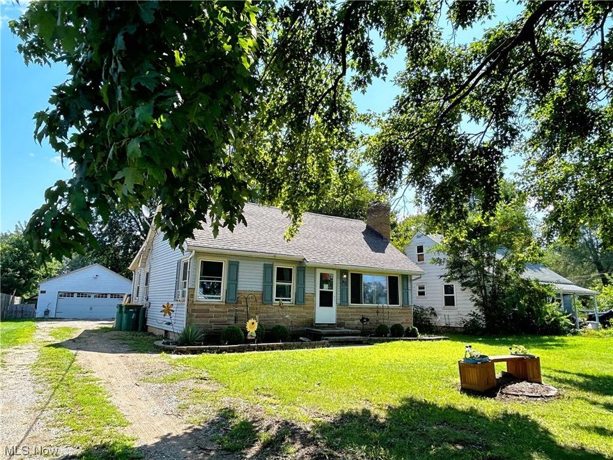 Quaint 3 Bedroom 2 full Bath in Painesville Twp with minutes of shopping, restaurants, schools, fairgrounds and parks.  Updated kitchen with newer flooring, appliances and plenty of cabinetry.  Dining room open to the kitchen and living room where natural light is abundant.  The Living Room has a wood burning fireplace with surrounding built in shelving.  2 bedrooms and 1 full bath are on the main level with another bedroom and office area, which could be a 4th bedroom, and another full bath on the upper level.  Original woodwork and built-ins is seen throughout .  New Washer & Dryer on the main level with access from the arched back porch area.  2 car detached garage.  Partially fenced in back yard with fire pit and privacy.  New sewer lines ran in 2022/2023.  Ready for you to call Home!!