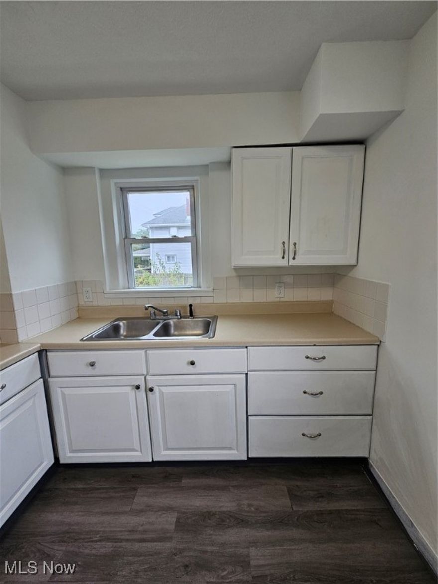 Updated 2 bedroom/1 bath home available in Akron. New kitchen appliances, recently painted. Spacious dining and living rooms. 2 good sized bedrooms on 2nd floor. Full basement with laundry hookups. Oversized 1 car detached garage. Fenced in backyard. No pets preferred; pets may consider for well qualified applicant(s) - pet deposit/rental would be required. No smoking. Tenants are responsible for utilities, yard work and snow removal. All adult applicants must apply online for credit, background, eviction history. $50 non-refundable application fee per adult applicant. Employment is verified. No third party applications permitted. All adult applicants must apply online for credit, background, eviction history. $50 non-refundable application fee per adult applicant. All Keller Williams Property Management residents are enrolled in the Resident Benefits Package (RBP). More details upon application. Please contact the listing agent for requirements prior to applying and details regarding the RBP.