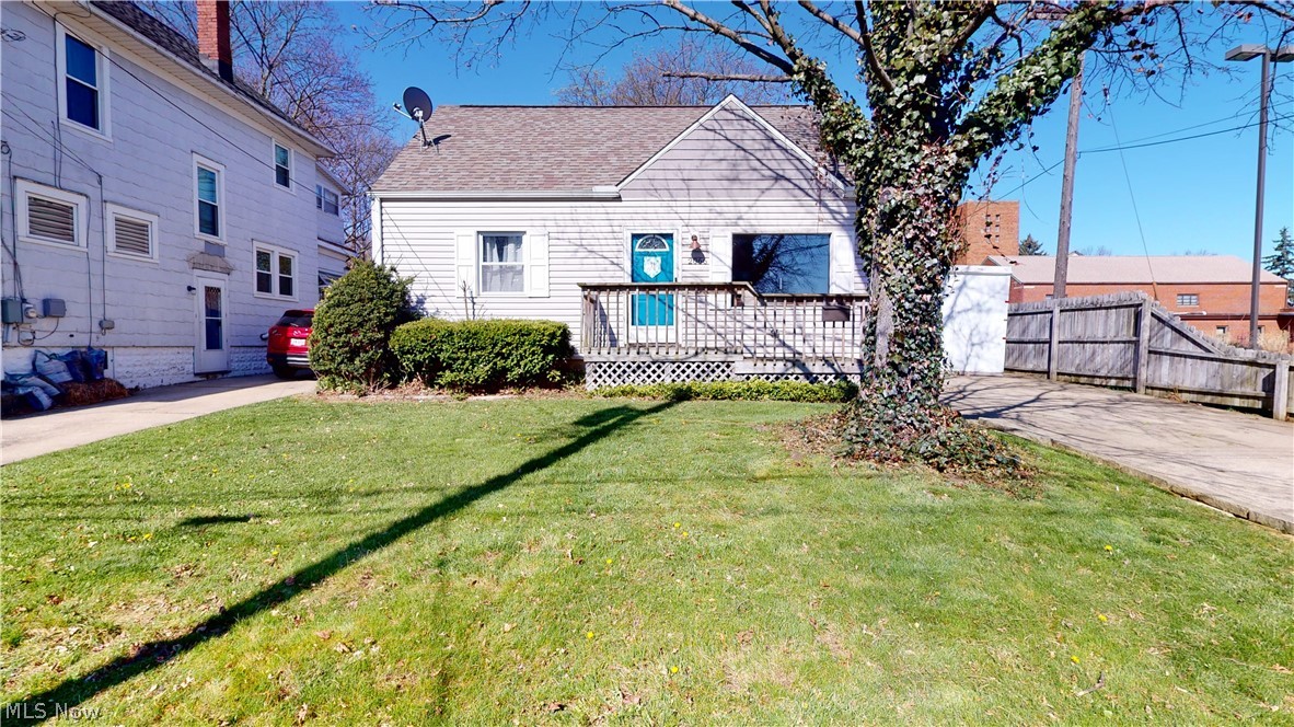 Cute, unique Cape Cod with bedrooms on all 3 floors. First floor has roomy living room with oversized front window, 1st floor bedroom and 1st floor GIANT bathroom that was redone in 2017 with quartz countertop, double sinks, tiled, walk-in shower and separate tub. Eat-in kitchen was completely redone in 2016 with all stainless steel appliances that stay, touch smart faucet, new cupboards, counters, backsplash, lights, flooring, breakfast bar and slider to deck, patio and partially fenced backyard. Upstairs is another bedroom and "loft" area that could be dressing area, office space, or your choice. Lower level has full bath with walk-in shower and two finished rooms currently being used as bedrooms with closets but could be rec rooms, work-out gym, or again your choice. First and second floors are all hardwood except newer laminate in kitchen, carpet in basement rooms except ceramic tile in bathroom and cement in laundry/furnace area. Updates include approximate dates: 2012-roof,