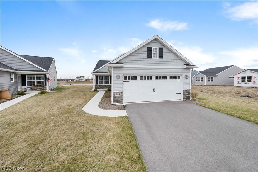 Immediately available condo in the up and coming Quarry Ridge development. Built on a premium lot this condo boasts a fabulous view of the pond. Built in 2020 the home is stunning and still feels like new! Sparkling gray Quartz countertops, stainless steel appliances, and a huge great room that blends the kitchen, living, and dining spaces. Everything you need on one level. Looking for more space? The partial basement is unfinished and can be turned into another living space, a storage space, or whatever is desired!