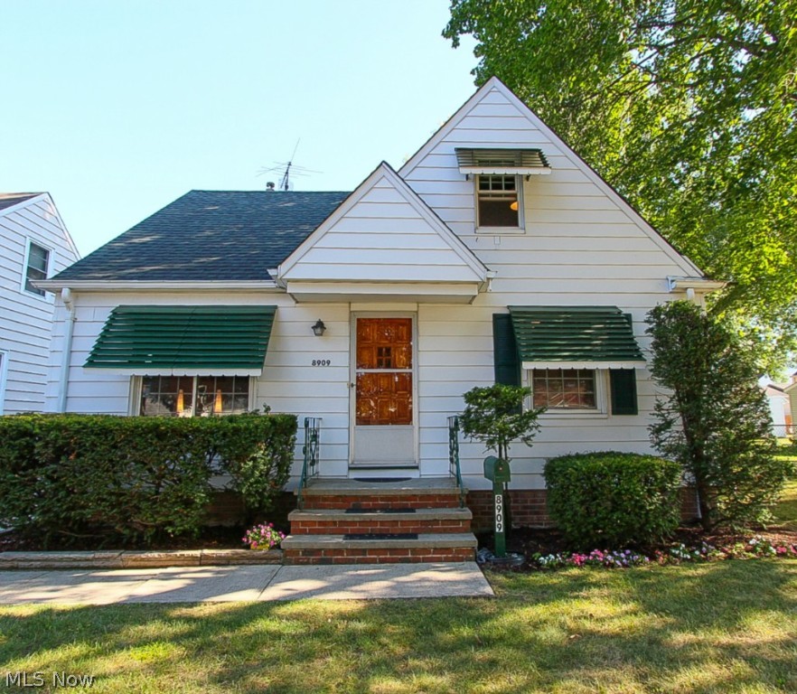 Well kept vintage & charming bungalow. Freshly painted living room w/crown molding. Gather the family in the Eat in kitchen w/vinyl flooring all appliance's stay. For your convenience there is a first floor bathroom w/ newer toilet. There are 2 first floor bedrooms w/hardwood flooring, one has walk in closet w/lights. The first floor also has plenty of room for storage w/several closets. The spacious 2nd floor master bedroom boasts knotty pine built-ins, cedar closets & a cozy nook perfect for an office. Large partially finished basement w/vinyl & glass block windows in the rec room. The fully fenced landscaped yard will be your own personal oasis. Keep your vehicle's away from the elements in the two car detached garage. Home warranty offered for your protection. Don't miss out on this lovely home. Call today!