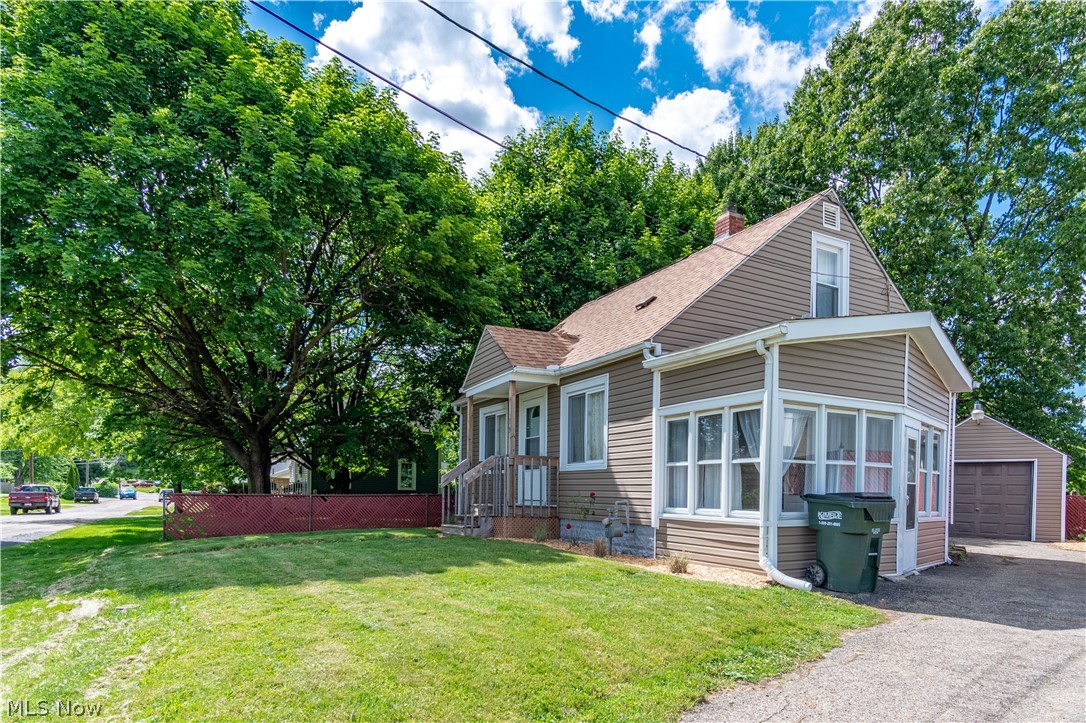 This adorable bungalow has been updated from top to bottom and is ready for its new owner!! Some updates in this home include new flooring throughout, brand new A/C and furnace (2020), Roof & siding (2016), Windows (2010), Hot water tank (2014), fully updated bathroom (2017), and glass block windows in the lower level. Walk through the front door into the large living room / dinette which leads into the fully applianced kitchen. Steps from the kitchen, there is an adorable enclosed sun room that is perfect for enjoying morning coffee or relaxing in the afternoon. In the upper level you'll find the large second bedroom and plenty of storage. The lower level is ready for your finishing touches. There is a room sectioned off, just needs drywall and it could be another bedroom or rec room. Great value on this home, schedule your showing today!