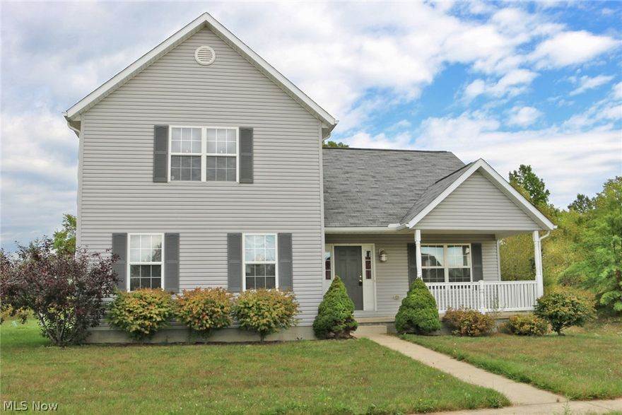 Spacious home ready for a new owner.  You will fall in love from the minute you step onto the large covered front porch and enter the front door into the cheery 2-story great room.  This home has a 1st floor master bedroom and bath, 1st floor laundry and 1/2 bath.  Upstairs you will find a large loft area with closet plus two additional large bedrooms and full bath.  The kitchen is fully applianced and open to a nice deck overlooking back yard.  Full basement for storage or additional living space.