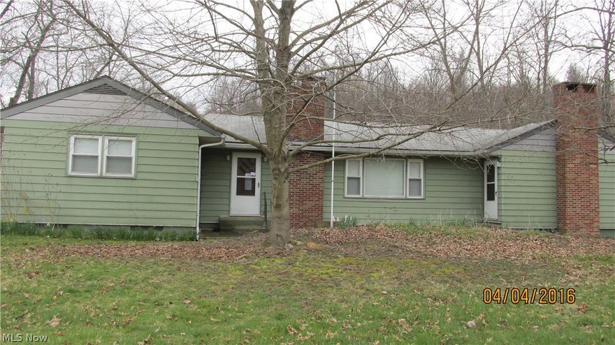 Ranch style home with 3 bedrooms and 1 bath.  Full Basement.  Large Family Room with fireplace.  Double car garage attached and a 2 car detached garage.  Barn with loft. Home is on 1 acre.