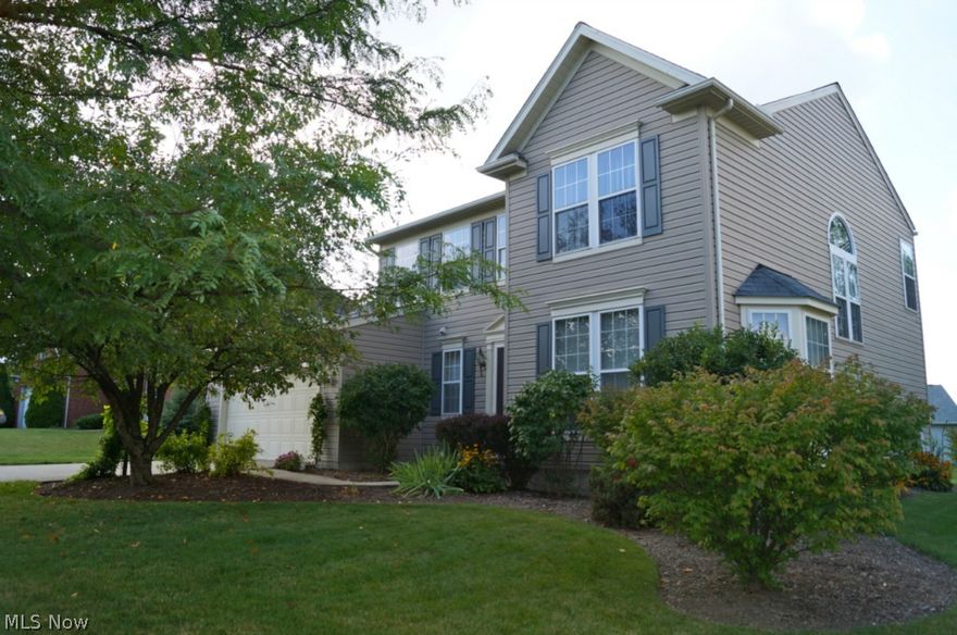 Step into the 2-story foyer with side-leading staircase, and find the perfect open concept 4 bedroom Colonial. Hardwood spans entry, through to the kitchen and dining room. Uba Tuba granite and newer stainless appliances. Kitchen opens to a large family room with gas fireplace, updated ceiling fan and custom window treatments. Extend your living and entertaining space onto the large deck off kitchen slider. Huge, well manicured lot. Back inside you'll find a formal dining and living room or perfect space to convert into 1st floor office. Partially finished lower level w/ tons of storage and plumbing for a 3rd full bath. Large master bedroom, walk-in closet and master bath with dual vanity, water closet, soaker tub and stand-a-lone shower. Addt'l full bath, loft, 2 large bedrooms & 4th bed perfect for a nursery, guest, playroom, or office, round out the 2nd story of this fabulous home. Newer roof (appx 4yrs old), neutral color pallet, interesting angles throughout and custom window trea