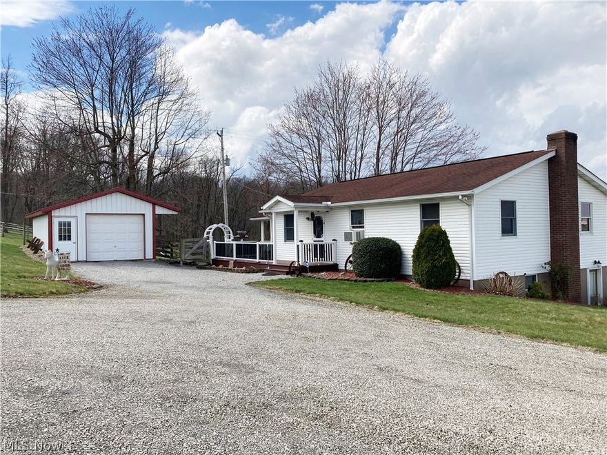 This property could sell with many different intentions due to the location and size. Whether you need to downsize, buying your first home, looking for a weekend getaway, or utilizing as an Air B&B, this property would be the perfect fit. Beautiful views of the surrounding farms and countryside, and walking distance to downtown Berlin. The main floor has an open feel with a bedroom and full bath. There was a 2nd bedroom on the main floor but has now been opened for an additional sitting room. It could easily be changed back to a bedroom. The full/walkout basement is dry, and has an area sectioned off as a bedroom, a 2nd bath, and laundry. Home still has natural gas lines in place with fixtures. Moving outside, there is a large maintenance free deck, a detached garage that has stalls with dutch doors, rubber mats, and a pipe stall system. There is a small pasture for a horse or couple animals. Call today for a private showing.