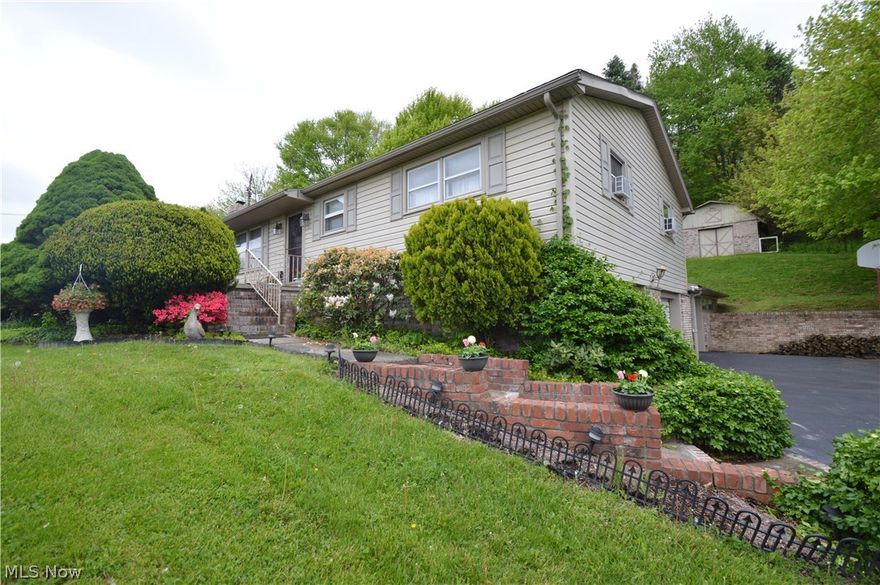 It is almost summer time and this home is absolutely perfect for making the most of those precious summer months! Ohio summers are as fine as they come and it is a shame to not enjoy them outside!  Dust off the pool toys and fire up the grill because this home is ready to be enjoyed to the fullest! This home features an absolutely stunning in ground pool, hot tub, and its very own tiki hut! Entertain guests from several different areas like  under your newly renovated patio and cabana area, front porch, or rear patio This home also offers the ultimate workshop just off of the garage. This space features 220w electric and water. It also has a mechanics pit for that car or mechanic enthusiast!  The interior of this home features a spacious living room featuring a large picture window,  huge kitchen, 3 bedrooms and 1 and half baths. The basement is finished and makes for the perfect family room. This lovely slice of country living sits perfectly on just over two acres. Call today because