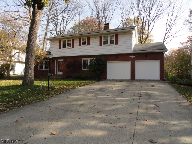 This 4 bedroom, 2.5 bath Colonial is in great condition. Step into the foyer entry with open staircase to the 2nd floor. Formal living room. The charming and updated eat-in kitchen has beautiful maple cabinets and hardwood floors and it opens to the cozy den with woodburning fireplace and a spacious dining area complete with breakfast bar. 4 generous sized bedrooms and 3 nicely updated bathrooms too! Newer windows and AC, waterproofed basement and extra insulation installed. Nice, large deck overlooks wonderful, big lot all in the desirable Oak Tree subdivision between Kent and Graham Rd. Very convenient to schools and Rt 8/Rt 77.