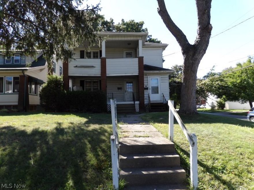 Charming 3 bedroom, 1 bath duplex located in Youngstown! Living room with fireplace, kitchen with appliances,  basement and covered front porch. Monthly rent is $325.00 plus all utilities. This will not last long MOVE IN READY!  Full deposit and first months rent required. No smoking or pets permitted. MUST SEE!