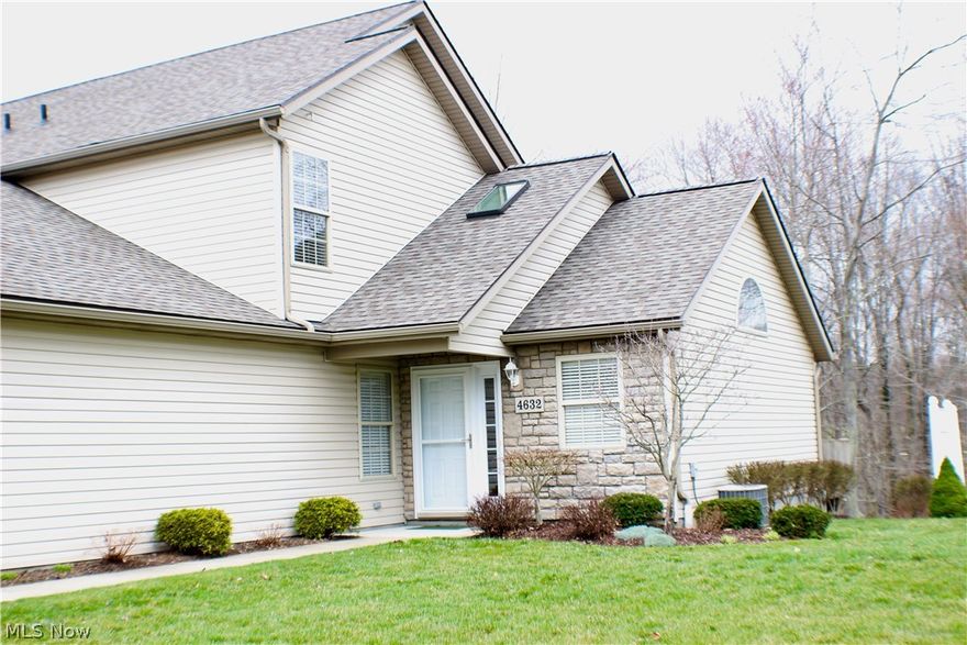 Welcome to 4632 Creekside Drive. Must see condo with open floorplan perfect for entertaining. Large living room w/ new carpet features vaulted ceilings & opens up to the eat-in-kitchen w/ slider doors to a large deck with a gorgeous private view! Kitchen includes all appliances. Laminate floors in kitchen, 1st floor bath, laundry & large first floor bedroom making for a perfect office space! 2 bedrooms upstairs features large walk-in closets, shared full bath. Fresh Paint Throughout! Convenient to Rt 76, downtown Kent, shopping, restaurants!