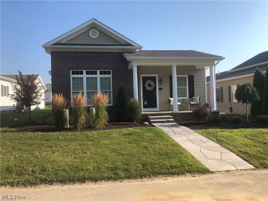 New construction Ranch featuring a true open concept floor plan in the Hampton Ridge community!  Great room with 12ft. ceilings and fireplace, white designer kitchen featuring quartz counters and appliance package, enclosed sunroom, den with French doors, master bedroom with custom tiled shower and walk-in closet.  Oversized 2 car garage (24 x 24), full 12 course basement.  Four other villa designs to choose from featuring a size and price for every lifestyle.  Convenient access to Rt. 680, PA and Ohio Turnpike.  Quality built by GreenHeart Companies.  This unit is currently under construction with a projected completion date of October 2023.  Note: Current pictures feature a completed villa.