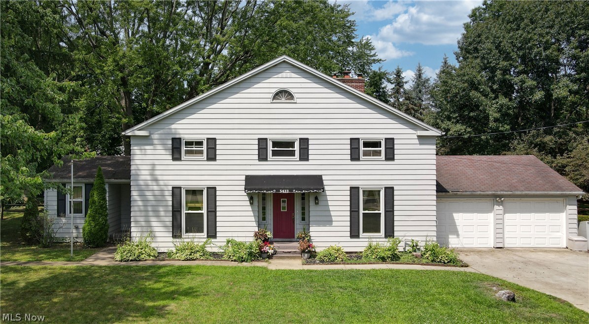 This amazing 3 bedroom Colonial is located in the heart of Lake Cable Allotments. Which means? Yes, lake rights on Lake Cable are available! The home was updated in 2017 by the previous owners. Enjoy coffee in the sun room overlooking the large fenced-in backyard, relax by the fireplace in the family room, and cook in the beautiful and cozy eat-in kitchen that has granite countertops, stainless steal appliances, tiled backsplash, and large windows. The laundry room is on the first floor as well as a full bathroom. The second floor hosts a sizable master bedroom with his and her double closets. There is also an open hallway area outside the master bedroom that can be used as an office or craft space. The two other bedrooms have large windows, nice sized closets and plenty of room. Tons of storage space. This home is located in a quiet neighborhood with a private setting. A lovely home that offers everything you need!