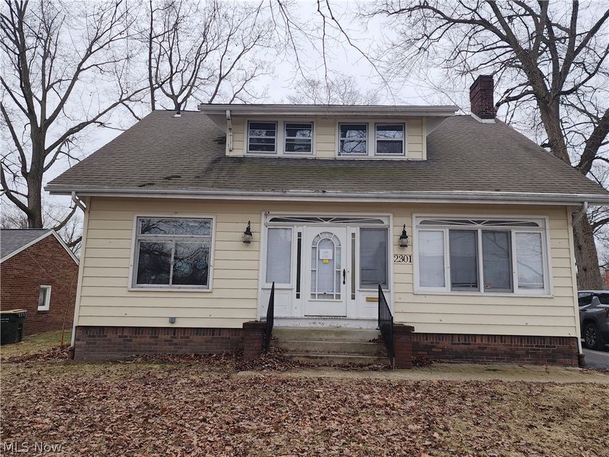 2 story home with living room with heated enclosed front porch, living room with fireplace and built in bookshelves, kitchen, dining room, 5 bedrooms and 2 full bathrooms. Property sold as is. No guarantees. No warranties. Must be pre-approved or show proof of funds.