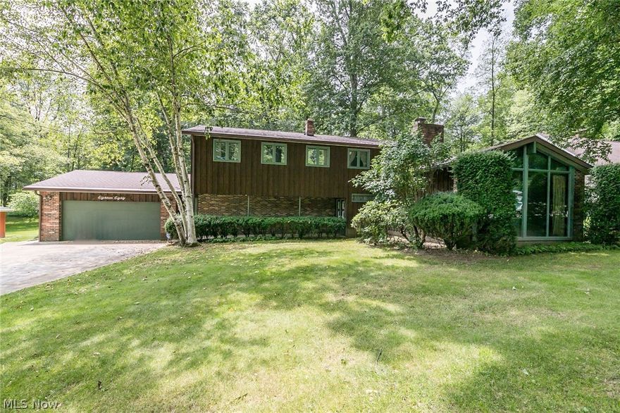 Are you looking for a good home that you can bring up to its full potential value as you improve it and make it your own? Then this beautifully-situated home in Franklin Township is The One! This contemporary colonial with mid-century modern touches boasts 4 bedrooms and 2.5 baths with first floor laundry on nearly 1/2 wooded acre. Lots of living space! Enjoy the beautiful vaulted living room with gas fireplace and a wall of windows, all of which have been replaced over time (Pella® throughout the entire home). Some pre-market improvements—The dining room and kitchen have new, June 2019, faux wood plank laminate. New carpet, also June 2019, has been installed in Family Room. Seller has very recently replaced the waste line from the upstairs bath and replaced furnaces and AC units, July 2019. Professional tub restoration work in each upstairs bath with 10 year warranty, June 2019. The Bonus Room between house and garage is awaiting your touches as the seller has removed carpet so you ca