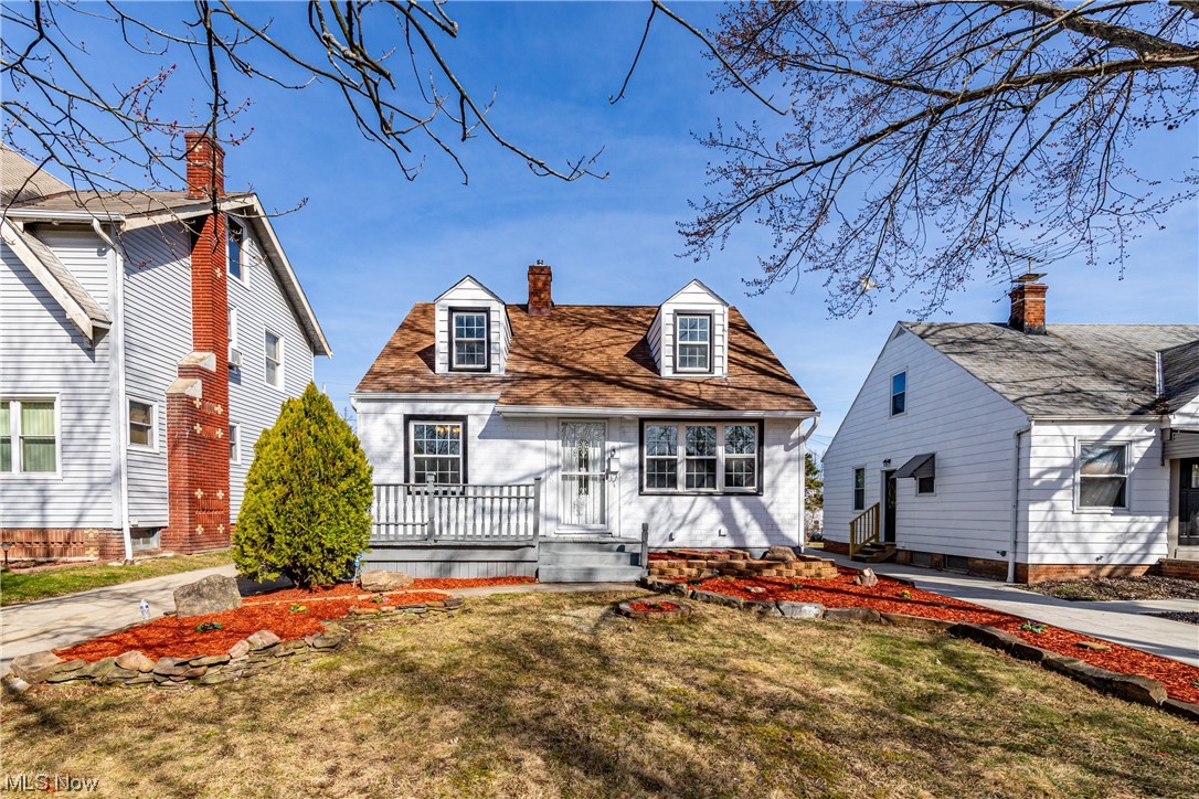 Welcome to this beautifully updated Cape Cod home, located in the community of Maple Heights. This charming residence boasts 3 cozy bedrooms and 2 full baths, making it a perfect sanctuary for families or anyone seeking comfort and style. The heart of this home, the kitchen is designed featuring a trendy subway-style backsplash and elegant butcher's block countertops that add warmth and character. Fresh paint throughout the home creates a bright and inviting atmosphere, complemented by new Luxury Vinyl Plank (LVP) flooring that combines durability with the beauty of hardwood. Step outside to discover a newly landscaped garden that promises tranquil moments and a delightful space for outdoor entertainment. The addition of a new AC system ensures your comfort during warmer days, while the partially finished basement offers extra space for leisure or storage. This Cape Cod is newly renovated to meet the demands of modern living while retaining its timeless charm. Don't miss the opportunity to make this your new home.