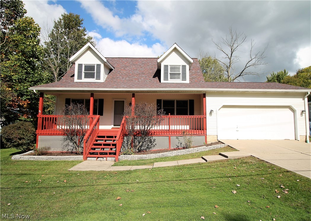 Charming, shutter trimmed Colonial Cape. Welcome to this three bedroom, two full bath home with loft. Come on in from the cozy large front porch (2018) into the living room, kitchen with eat in area. The large open kitchen has an abundant of cabinets, stainless steel fridge and dishwasher, eat in area with doors to let the natural light shine through that leads you to the gorgeous deck (2019) and backyard to enjoy sitting out and relaxing, entertaining etc. There are two bedrooms and a full bathroom on the first floor. Upstairs you have a huge loft/office area, and another bedroom that has double closets and vaulted ceiling with a remodeled full bathroom that has marble counters and newer fixtures. The lower level offers a full partially finished basement that offers nature stone flooring. WOW! This home has so much space! The large backyard has a shed and so much outdoor space. There is a attached two car garage with drain, electric, water available, door opener (2012) and extra parki