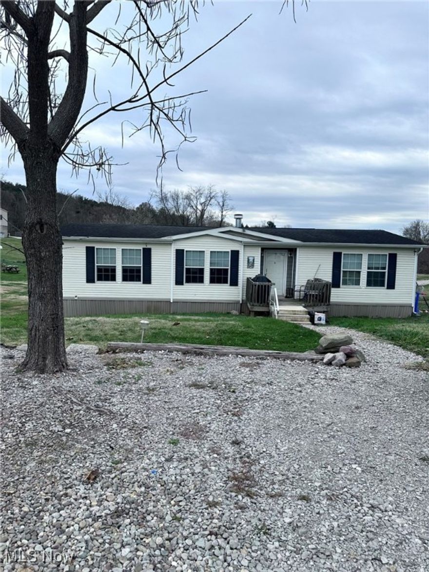 Welcome to 116 Homewood Road! This well-maintained 3 bedroom, 2 bath modular home offers 1,404 sq. ft. of comfortable living space on a 0.28-acre lot in South Parkersburg. Built in 2009, the home features an open floor plan designed for both convenience and functionality. Inside, you'll find a spacious living room that flows easily into the kitchen and dining area, perfect for gatherings or entertaining friends. The kitchen offers ample cabinet space and a central layout that makes cooking and hosting simple. The primary suite includes a private bath, while two additional bedrooms and another full bath provide plenty of room for guests. Outdoors, the mostly-level yard provides space for gardening, play, or relaxation. The Storage building does not convey and will be removed. (not permanently fixed) While there is no garage, the property offers plenty of parking space. Located close to shopping and dining, this home blends comfort and accessibility at an affordable price point. 116 Homewood Road, Parkersburg, WV 26101  |  3 Bedrooms | 2 Bathrooms | 1,404 Sq. Ft. | 0.28 Acre Lot. Don't miss your chance to see this one, schedule your private showing today!