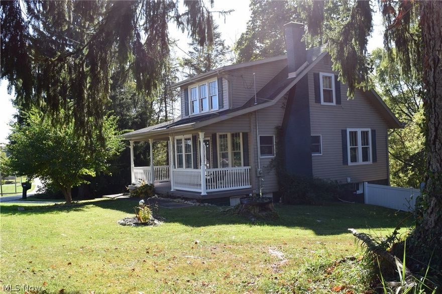 Spacious well maintained home with many updates.  Large living room w/fireplace opens to the large formal dining room. The kitchen has plenty of cabinets, countertops and built-in table. Large sunroom just off of the kitchen adds additional living space.  A beautiful wide staircase leads to the upstairs with three bedrooms and a full bathroom.  Plenty of space in the lower level to convert into a family room.  Concrete driveway and patio w/vinyl fencing.  Over an acre of land with this property.  Beautiful views of many species of trees and wildlife.  You will feel like you are living in the country, but you are actually close to everything.  This is a property that you must truly see to appreciate!