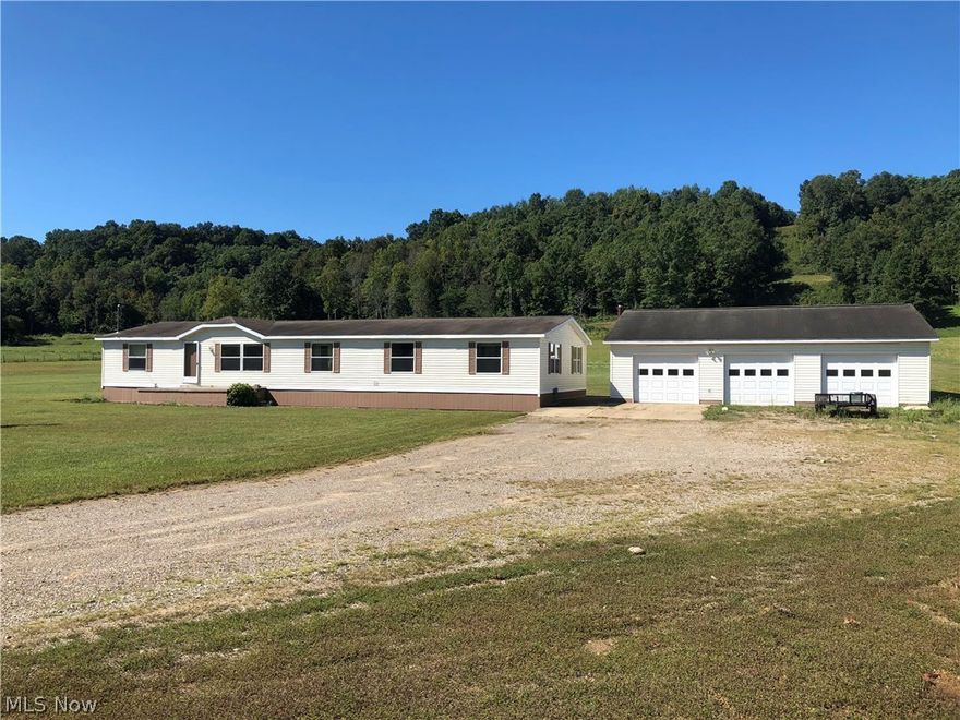 Enjoy the Country Life, Boat or Fish on the weekends with River Frontage & 12.163 acres-Approx 30 mins to Downtown Zanesville/Interstate I-70/Route 40/Route 146/St Rt 60.  Detached Heated 3-Car Oversized Garage.  Family home features 4 Bedrooms & 2 Full Baths.  Home layout separates Master Living to the Left of the Kitchen and Living Room, and then to the Right-End of the home the additional 3 Bedrooms, Full Bath, Built-In Study Desk Area, & Entertainment Room.  Laundry Room Washer & Dryer Stay!  Master features:  Master Bath w/2 Closets, Whirpool Tub, & Walk-In Shower.  Kitchen features 4x4 Pantry, All Appliances Stay-Including Brand New Dishwasher, Spacious Cabinets, Breakfast High Bar & Stools, and room for Dining Room Table and Built-In Hutch.  Hutch in Living Room & Dining Room to can stay!  New Survey completed 2 parcels into 1 parcel for the combined 12.163 acres.  Relax on back lifetime deck & patio with fire pit and enjoy star-filled evenings and campfires!  Handyman dream bar