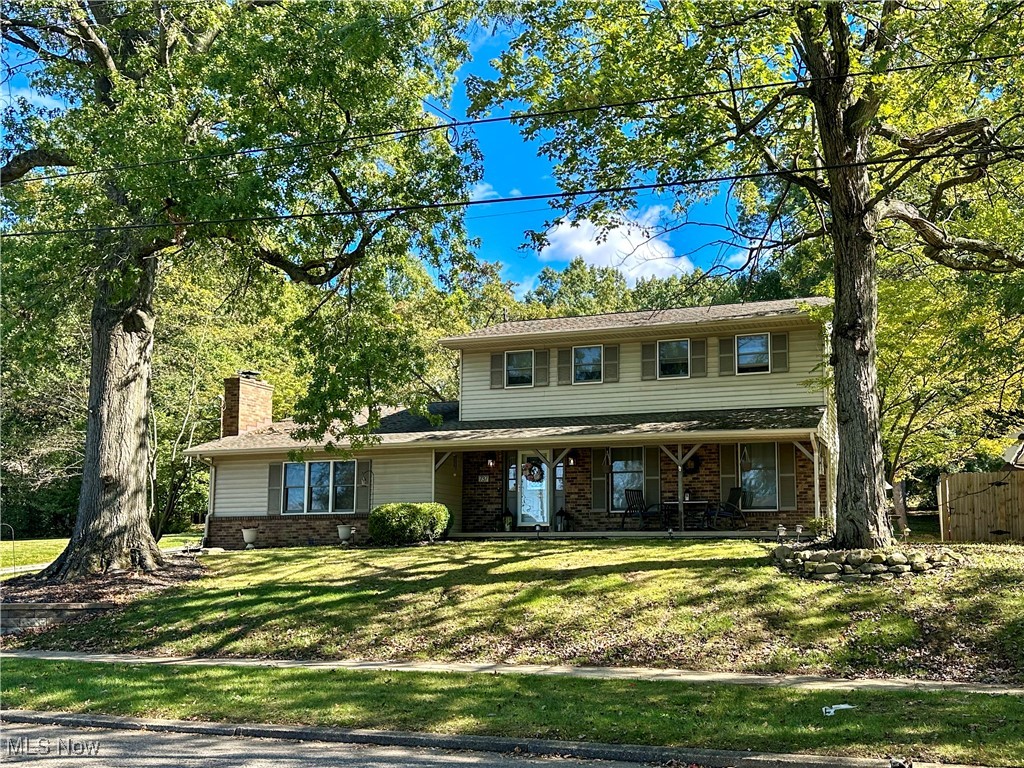 This beautiful 3 bedroom, 2.5 bath Colonial is situated on a spacious corner lot in a quiet cul-de-sac. The first floor includes lovely formal living and dining rooms, family room with a cozy fireplace, updated eat-in kitchen with ample cabinet and counter space, a charming sunroom, and half-bath. The second level highlights three large bedrooms, including the primary bedroom with a walk-in closet and access to the remodeled main bath. The basement offers a rec room, full bath, laundry area, and tons of storage space. Outdoor entertainment is made easy with a backyard deck and concrete patio featuring an impressive stone firepit. Schedule an appointment to tour this wonderful home today!