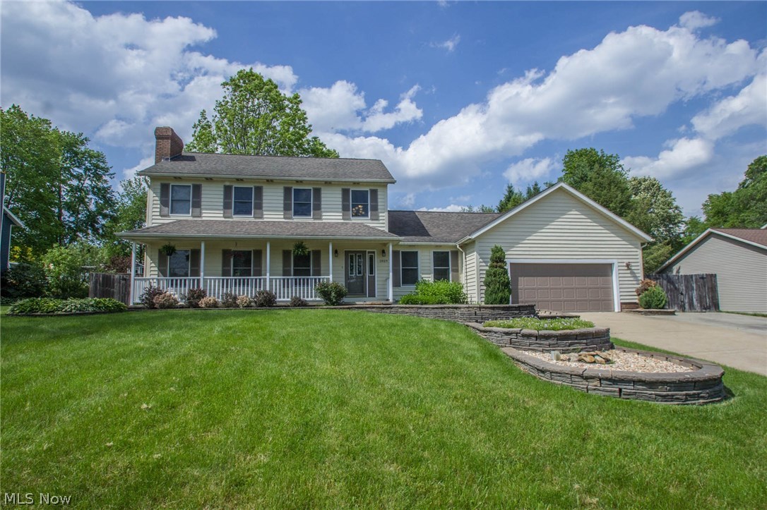 Over 2,200 square feet in this beautifully updated 4 bedroom 2.5 bath Colonial. This home boasts an impressive two story foyer, over-sized 2 car garage and workshop, fully fenced in back yard with outbuilding and patio, and a quiet cul de sac neighborhood. You will love the vaulted ceilings in the master suite and bath. Three good size bedrooms, all with ample closet space. First floor laundry. Nice size kitchen with center island. Nice size family room with fireplace and living room too! Nothing to do but move in. Call for your showing today.