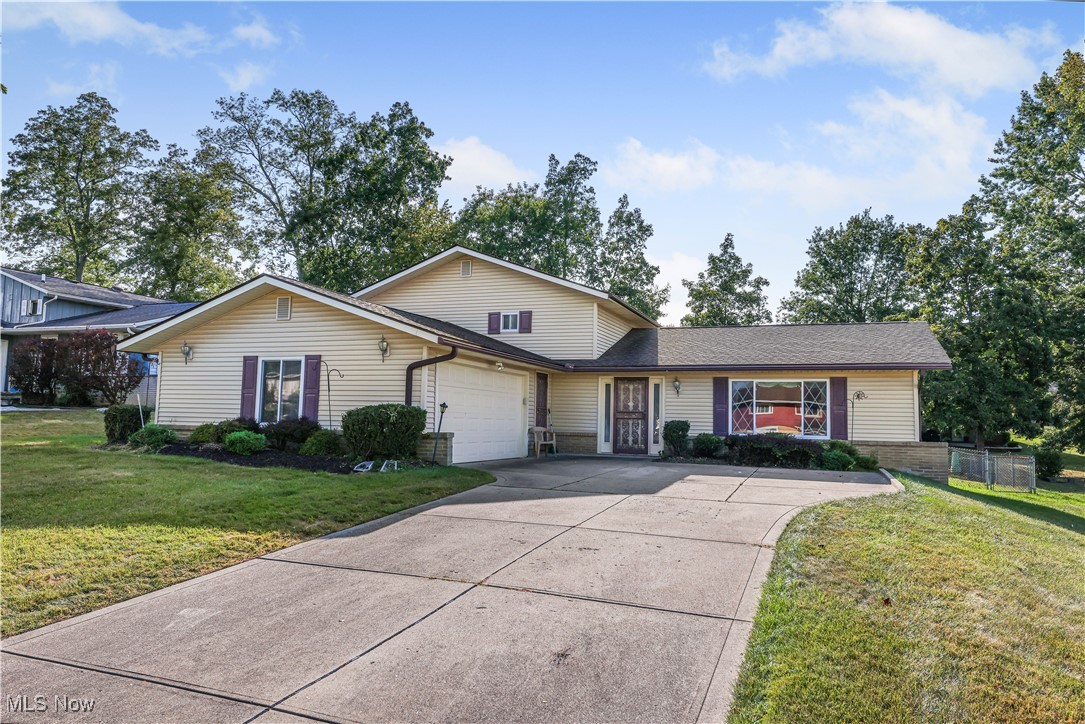 Welcome home to this beautifully maintained 3-bedroom, 3-full-bath home offering abundant space, thoughtful updates, and a layout perfect for everyday living or entertaining. Step into the foyer and be greeted by a bright, oversized living room that flows seamlessly into the formal dining area—ideal for family gatherings and special occasions. The eat-in kitchen comes complete with most appliances and opens to a charming, 3-season room filled with natural light—perfect for morning coffee or relaxing with a book. Just a few steps down, you’ll find a spacious family room with a cozy wood-burning fireplace, creating the perfect spot for movie nights or winter evenings. The large laundry room, complete with washer and dryer, offers walk-up access to the garage from the utility area for added convenience. The full bathroom in the lower level offers a jacuzzi tub to melt your stress away! Peace of mind comes with the big-ticket updates already done for you: HVAC (2022), roof (2022), newer hot water tank, and updated vinyl tile flooring in the primary bathroom.
Out back, enjoy a well-maintained lawn and an additional patio just off the 3-season room, a fenced-in yard for pets and play, and plenty of space for outdoor entertaining. Fall in love with this inviting home and make it yours today!