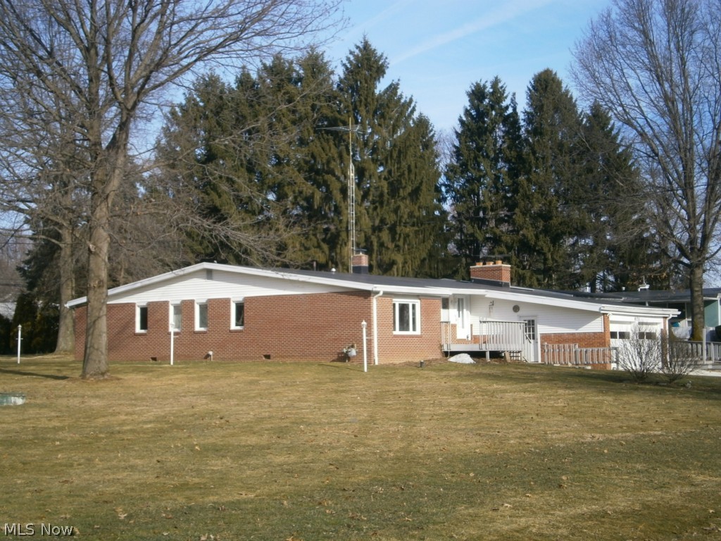 Remarkable move in ready home in a great location! Contemporary design features a spacious living room, 2 wood burning fireplace, formal dining room, 4 bedrooms, 2 full baths and 1 half bath. Large kitchen features oak cabinets with Corian counter tops. Hardwood floors throughout. Large master bedroom includes a private full bath and a walkout French door that opens to a back yard patio. Two large decks and rear patio provide plenty of outdoor living space. Large double parcel lot in this quiet neighborhood offers a private location in North Canton city school district. Zone heating is provided by two newer furnaces and the home includes a reverse osmosis water filtration system. Two additional French doors and wheel chair ramp make this home handicap accessible. Partially finished basement contains a rec room with a fireplace. Do not miss this uniquely beautiful home!