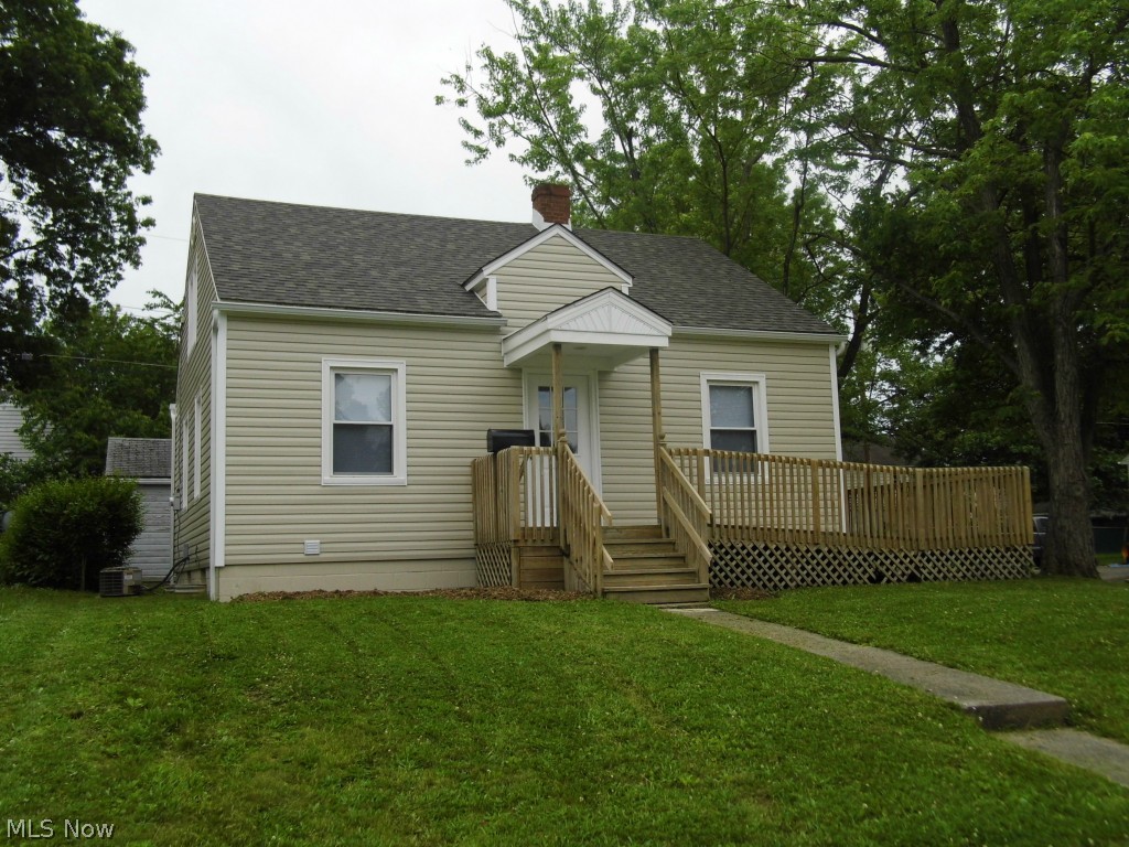 Stunning completely remodeled home! Garage just REPLACED WITH BRAND NEW GARAGE 7/2014, 3 bedroom 2 full bath with finished basement area and full finished basement bath! You will be proud to show this one! Great remodel with professionally designed selections in neutral colors yet great design and looks! Finished basement is an awesome bonus! Large 2nd floor bedroom with built in storage and drawers makes this an awesome Master or secondary living space and with the finishes in the basement (including the bath) makes this a Don't miss out on this one! New roof, new remaining windows, new siding, new gutters, new soffitt, new fascia, new hot water tank, new furnace, new paint, new lights in most areas, new electric panel, new flooring, new kitchen, new baths! Wow!.... Come see for yourself...it's stunning! Ramp on front makes it accessible and new garage makes this one of the best homes in the area and a great value for the price! Corner lot with good yard and garage entry off the other