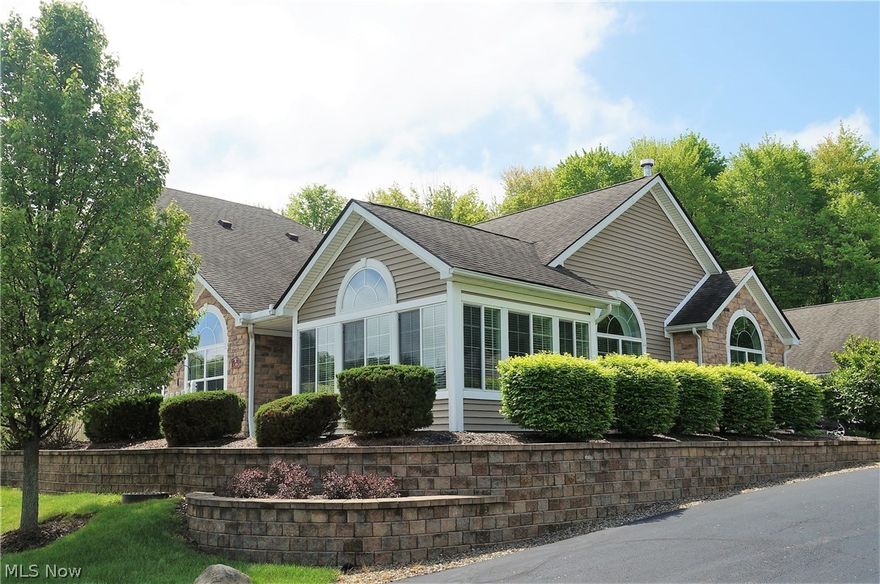 Come check out this turn key maintenance free condo located at 136 Shaw Dr. Why wait to build it when you can have it now? Open and spacious yet functional. Updated kitchen with state of the art stainless steel appliances, granite counter tops, and new flooring. Large eating area and adjoining great room that has a gas fireplace. Sun room has lots of windows allowing for natural light to shine in. Master suite with cathedral ceiling, double vanity sink and walk in closet. Large second bedroom and a den/office to relax in as well. First floor laundry with cabinets for storage, a utility sink, washer and dryer included! Club house with a pool, work out room and plenty of space for more entertaining too! All this and in a perfect location with minutes to downtown Kent, Kent State University, shopping and highways. This one should not be missed. Carefree living at its best! See it today.