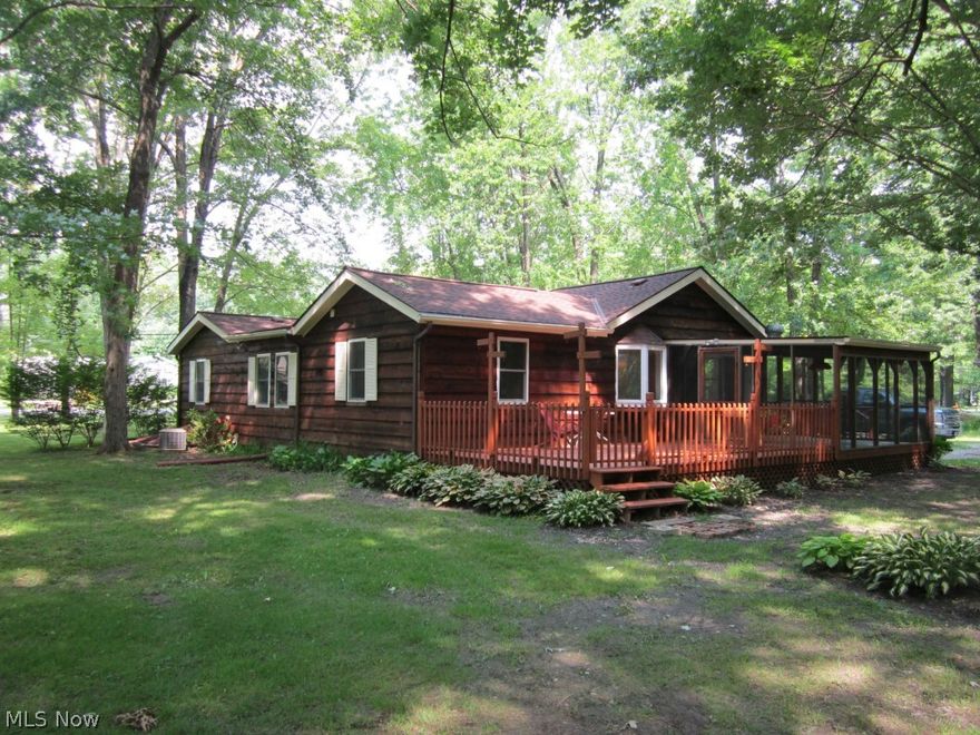 Welcome to this open ranch floor plan totally updated and ready to move into. Corian counter tops in kitchen with lots of cabinets and ceramic tile. Wood Floors, wood stove, cathedral ceilings, skylights, master bath, this home as it all! 4 car garage and storage area. Mature trees everywhere. Large deck area with extra screened in porch. All this and more sitting on over 20 acres. Don’t let this one get away it definitely won’t last long.